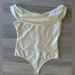 Express Ivory Satin Off The Shoulder Thong Bodysuit. NWT. Size M. Style 06419308